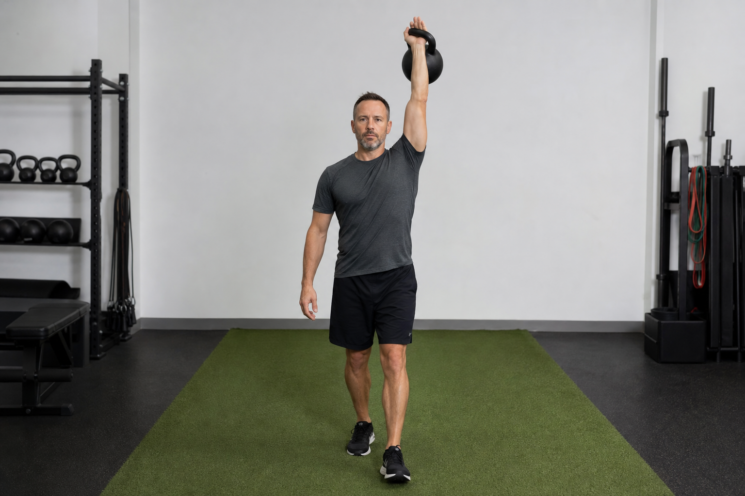 Pickleball strength training with kettlebell overhead carry for shoulder control and core stability